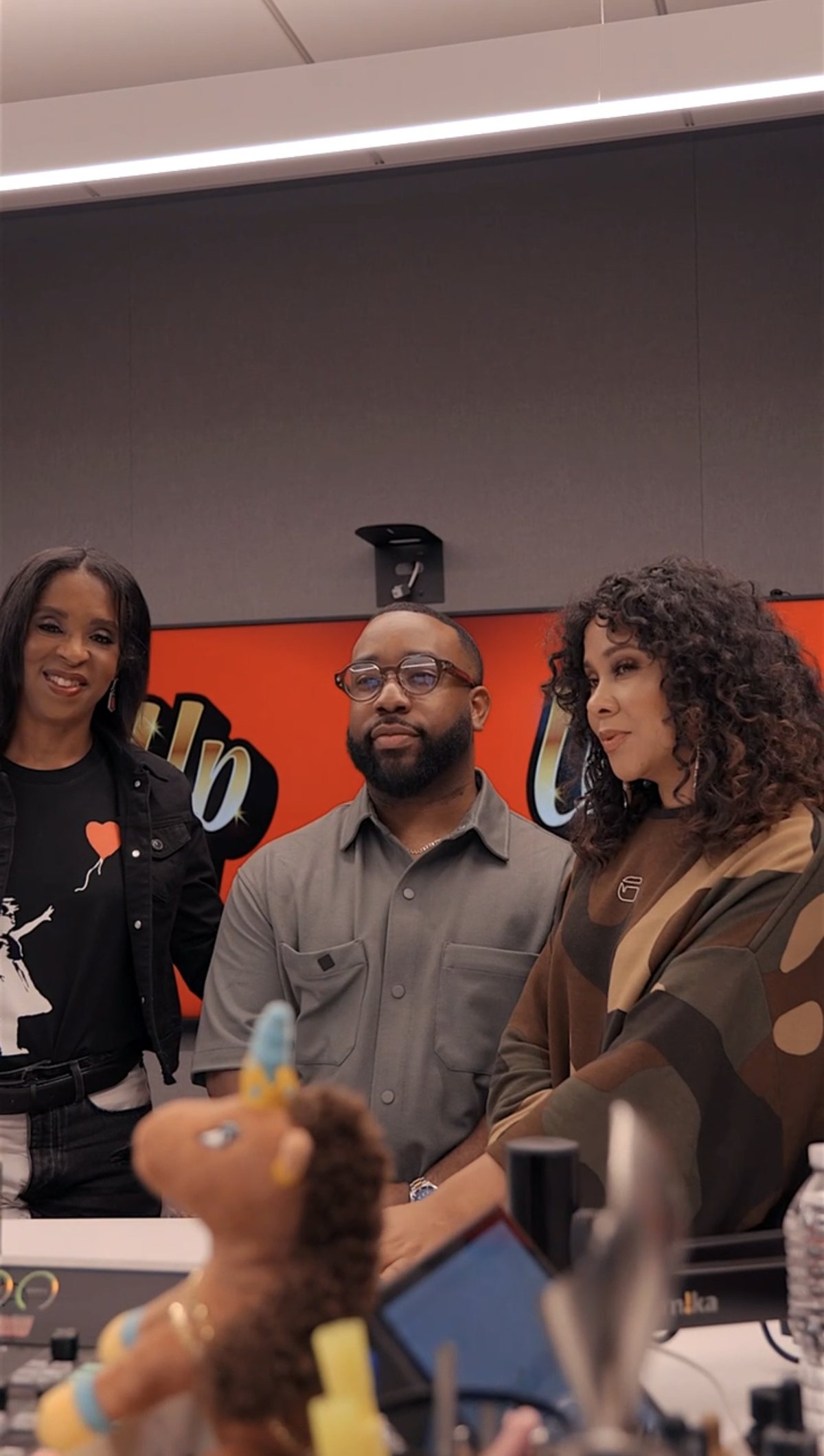 Shawn Anthony beside Angela Yee as a guest on Way Up