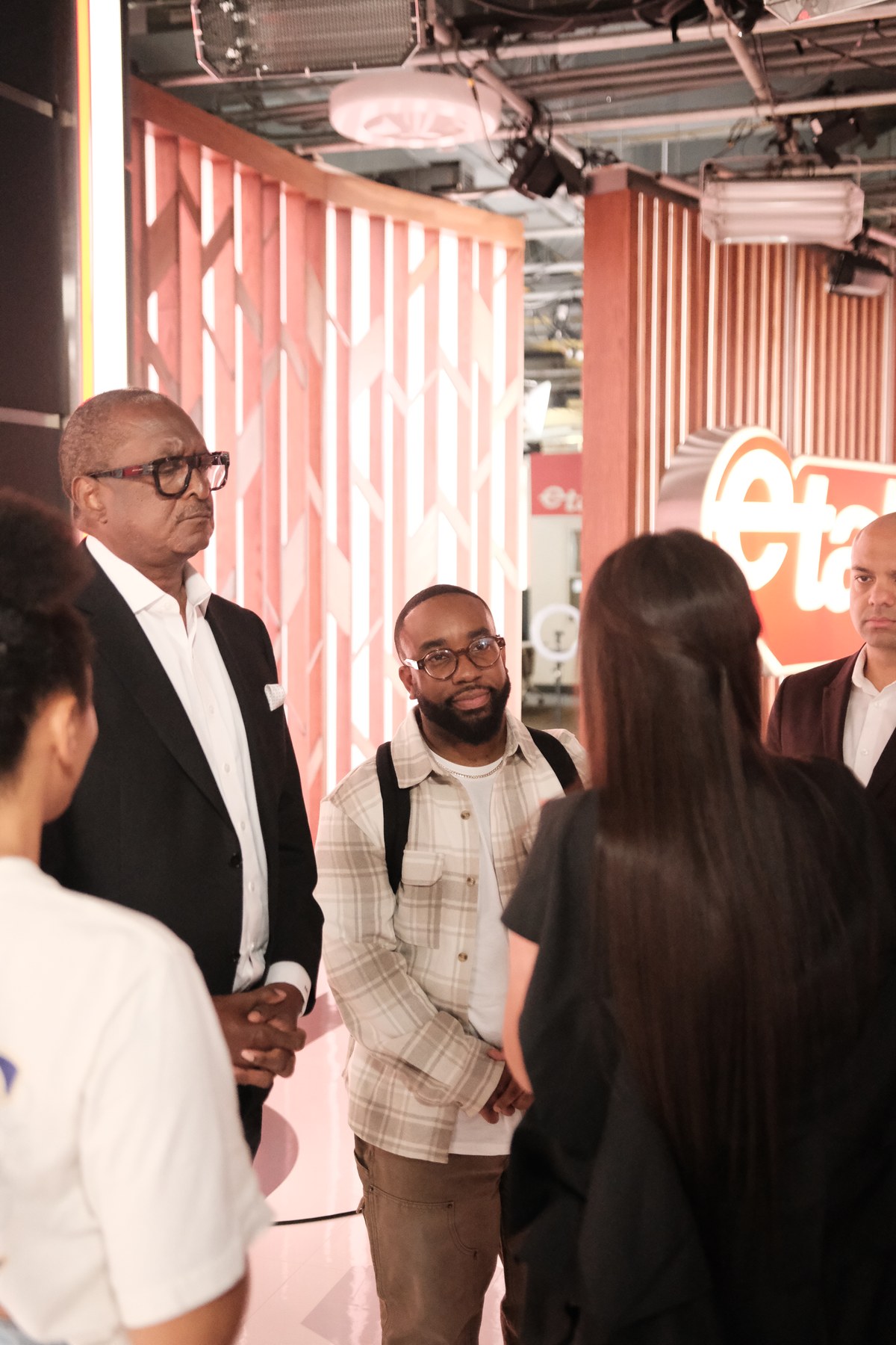 Shawn Anthony standing with Mr. Mathew Knowles behind the scenes on the national Canadian television show eTalk